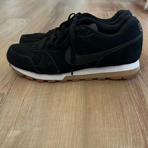 Women’s black sneakers